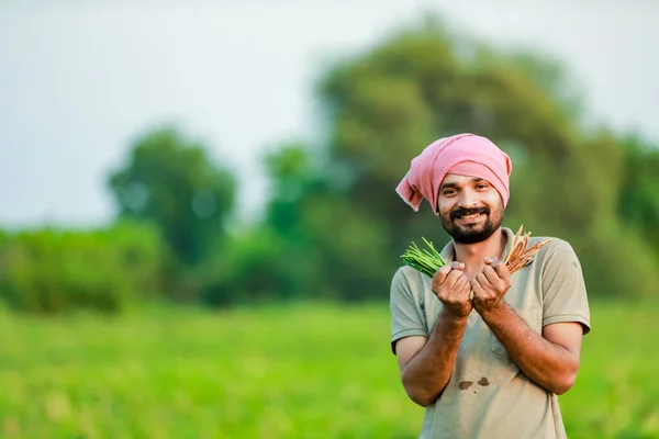 depositphotos_667522188 stock photo indian cwopea farming farmer holding